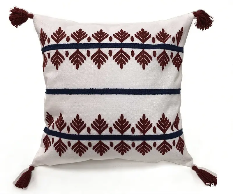 Scandinavian-Inspired Red And Blue Tasseled Outdoor Cushion 1